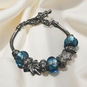 Elegant Silver and Blue Charm Bracelet